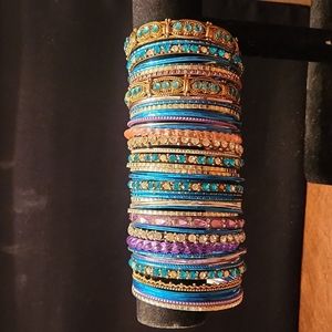 40+ blue and multicolored bracelets